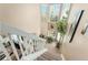 Bright and airy staircase with multiple windows and natural light at 6819 S Webster St # E, Littleton, CO 80128