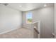 Bedroom featuring neutral walls, carpet, and a scenic view from the window at 7303 Dolores Ave, Frederick, CO 80530