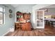 Charming bedroom area featuring a wooden desk and good natural lighting at 3600 S Pierce St # 1-207, Denver, CO 80235