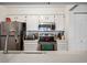 Bright kitchen offering modern stainless steel appliances and light countertops at 3600 S Pierce St # 1-207, Denver, CO 80235