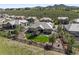 Home with meticulously landscaped yard, features a patio and fire pit for outdoor enjoyment at 4868 Hogback Ridge Rd, Morrison, CO 80465