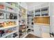 Walk-in pantry offering generous storage space with organized shelving and countertop at 4868 Hogback Ridge Rd, Morrison, CO 80465