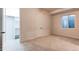 Neutral bedroom features a carpeted floor, a closet, and a window allowing natural light at 8 S Colorado Blvd, Denver, CO 80246