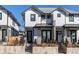 Charming modern townhomes feature striking curb appeal with stylish architectural details and landscaping at 8 S Colorado Blvd, Denver, CO 80246