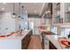 Spacious kitchen boasts a large island, stainless steel appliances, and stylish pendant lights at 8 S Colorado Blvd, Denver, CO 80246