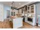 Stylish kitchen with island, stainless steel appliances, modern lighting, and ample counter space at 8 S Colorado Blvd, Denver, CO 80246