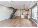 Open floor plan featuring a modern staircase and kitchen with a large island at 8 S Colorado Blvd, Denver, CO 80246