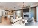 Open floor plan with living room, dining area, kitchen, and fireplace at 8 S Colorado Blvd, Denver, CO 80246