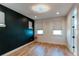 Minimalist main bedroom with hardwood floors and ample natural light at 8 S Colorado Blvd, Denver, CO 80246