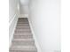 Carpeted staircase leading to the upper level at 30093 Chisholm Trl, Elizabeth, CO 80107