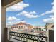 View of the community clubhouse, pool and playground from a balcony, under a blue sky at 4730 Copeland Cir # 203, Highlands Ranch, CO 80126