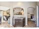 Stylish kitchen featuring a breakfast bar with a view into the adjacent living room at 4730 Copeland Cir # 203, Highlands Ranch, CO 80126