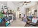 Bright living room featuring fireplace, built-in storage, and open access to the kitchen at 4730 Copeland Cir # 203, Highlands Ranch, CO 80126