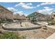 Exterior view of playground with mature landscaping and multi-Gathering homes in background at 4730 Copeland Cir # 203, Highlands Ranch, CO 80126