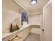 Bright closet with hanging clothes, shelving, and a well-lit interior space at 5206 S Meadow Lark Dr, Castle Rock, CO 80109