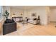 Comfortable living room with stylish decor, modern furniture, and light-colored wooden floors at 5206 S Meadow Lark Dr, Castle Rock, CO 80109