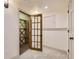 Spacious wine cellar featuring custom shelving to store and display wine collection at 5206 S Meadow Lark Dr, Castle Rock, CO 80109
