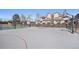 Community basketball court with two hoops and nearby residential units at 8391 S Upham Way # 209, Littleton, CO 80128