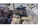 Aerial view of the backyard featuring a two-level deck and well-kept lawn at 2062 Eudora St, Denver, CO 80207