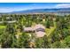 A beautiful, serene aerial shot showcasing mountain views and the surrounding landscape at 18680 Knollwood Blvd, Monument, CO 80132