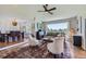 Inviting living room with large windows, natural light and mountain views at 18680 Knollwood Blvd, Monument, CO 80132