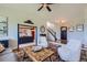 Open-concept entry and living room with natural light and elegant finishes at 18680 Knollwood Blvd, Monument, CO 80132