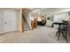 Spacious basement with cozy seating, a bar area, and ample room for entertainment at 11830 Snowshoe Dr, Parker, CO 80138