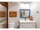 Basement bathroom with single vanity, toilet and shower at 3448 Ghost Dance Dr, Castle Rock, CO 80108