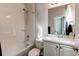 Clean bathroom featuring a shower/tub combo and vanity at 3448 Ghost Dance Dr, Castle Rock, CO 80108