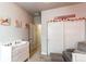 Bedroom featuring a changing table and glider at 3448 Ghost Dance Dr, Castle Rock, CO 80108