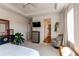 Main bedroom with en-suite bathroom access and sitting area at 3448 Ghost Dance Dr, Castle Rock, CO 80108