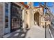 Attractive home exterior featuring a secure door and shaded front porch at 1965 Jasmine St, Denver, CO 80220
