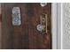 Close up of the front door featuring decorative hardware and a crystal door knob at 1965 Jasmine St, Denver, CO 80220