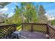 A quaint wood deck with a lattice railing provides a serene spot to relax outdoors at 9430 Osceola St, Westminster, CO 80031