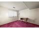 The bedroom features carpeted floors and a window offering plenty of natural light at 9430 Osceola St, Westminster, CO 80031