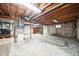 Unfinished basement offers ample storage space and potential for customization at 4643 S Vivian Ct, Morrison, CO 80465