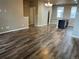 Bright living room with hardwood floors, open layout, and modern lighting at 4280 E Warren Ave # 2, Denver, CO 80222