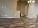 Spacious living room featuring hardwood floors and neutral paint at 4280 E Warren Ave # 2, Denver, CO 80222