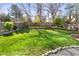 Large grassy backyard with a garden at the rear at 5432 S Cathay Way, Centennial, CO 80015