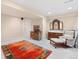 Finished basement area featuring a decorative rug, accent furniture, and neutral walls at 5432 S Cathay Way, Centennial, CO 80015