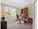 Bright room with large window, desk, chair, and ample storage space at 5432 S Cathay Way, Centennial, CO 80015