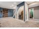 Finished basement area with a glass-enclosed wine cellar and modern design at 7786 Windwood Way, Parker, CO 80134