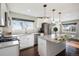 Bright kitchen featuring white cabinets and granite countertops at 2930 N Fillmore St, Denver, CO 80205