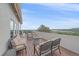 Outdoor balcony with fire pit and cushioned seating, with expansive views at 17313 W 43Rd Dr, Golden, CO 80403