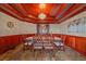 Formal dining area boasts detailed millwork, elegant chandelier, and furniture for sophisticated gatherings at 17313 W 43Rd Dr, Golden, CO 80403
