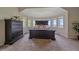 Bright and airy main bedroom boasting large windows and tasteful decor, creating a peaceful retreat at 17313 W 43Rd Dr, Golden, CO 80403