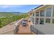 Enjoy scenic views from this rooftop deck with ample seating, perfect for entertaining and relaxation at 17313 W 43Rd Dr, Golden, CO 80403