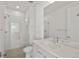 Modern bathroom with a glass-enclosed shower, sleek vanity, and contemporary fixtures at 1815 N Williams St, Denver, CO 80218