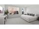 Serene bedroom with soft natural light, a comfortable bed, and a minimalist design at 1815 N Williams St, Denver, CO 80218