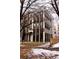Contemporary apartment building with modern facade and striking architectural details in winter at 1815 N Williams St, Denver, CO 80218